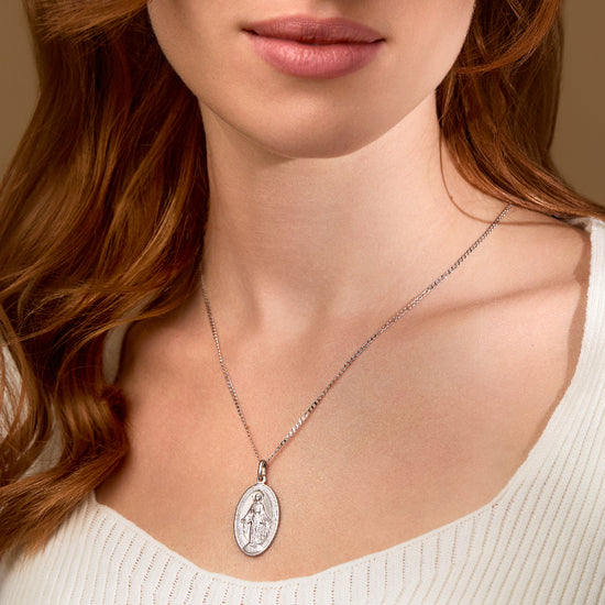 Medallas de plata de la Virgen María