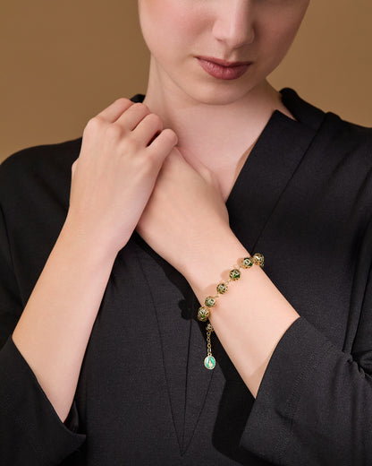 MONDO CATTOLICO ROMA Bracelet 21 cm (8.27 in) / 8 mm (0.31 in) Gold-tone Rosary Bracelet with Green Crystal Beads and Bead Caps