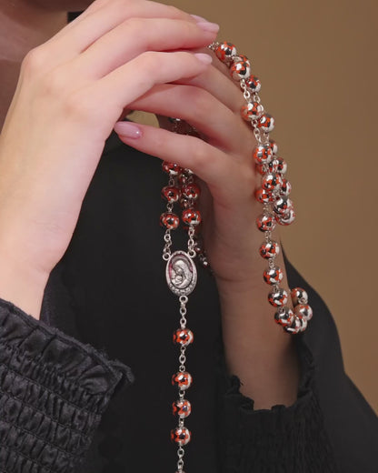 Chapelet du Sacré Cœur de Jésus en grains argentés décorés de fleurs oranges