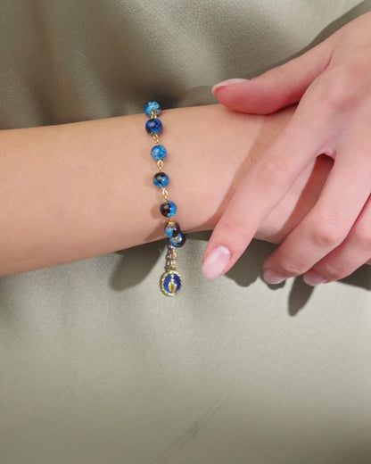Bracciale Rosario Dorato con Grani Variegati Blu
