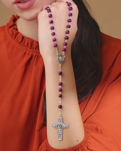 Rosenkranz aus buntem Glas mit Kreuz des Guten Hirten