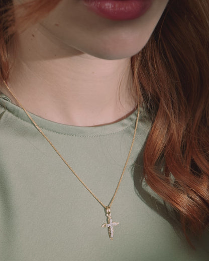 Yellow Gold Wavy Cross Pendant With White Gold Center and Cubic Zirconia